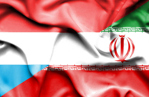 istock Waving flag of Iran and Luxembourg 668976600