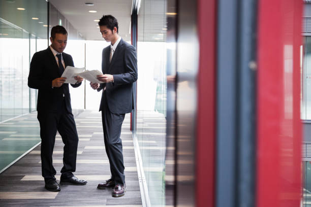 istock Japanese businessmen in the office 668977010