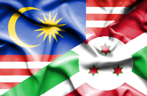 istock Waving flag of Burundi and Malaysia 668977482