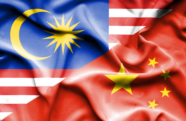 istock Waving flag of China and Malaysia 668977502