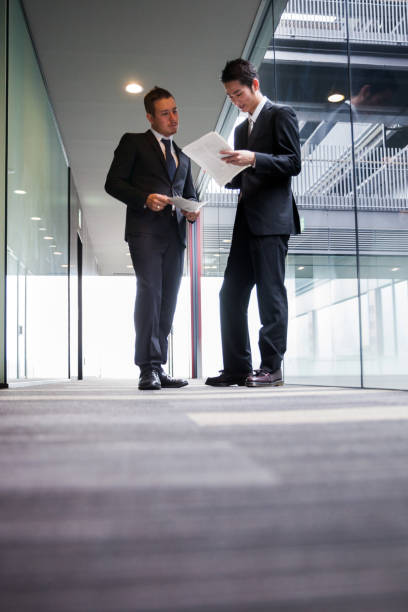 istock Japanese businessmen in the office 668982450