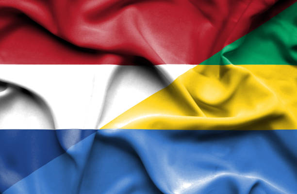 istock Waving flag of Gabon and Netherlands 668982466