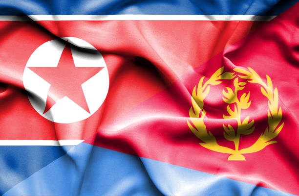 istock Waving flag of Eritrea and North Korea 668983270