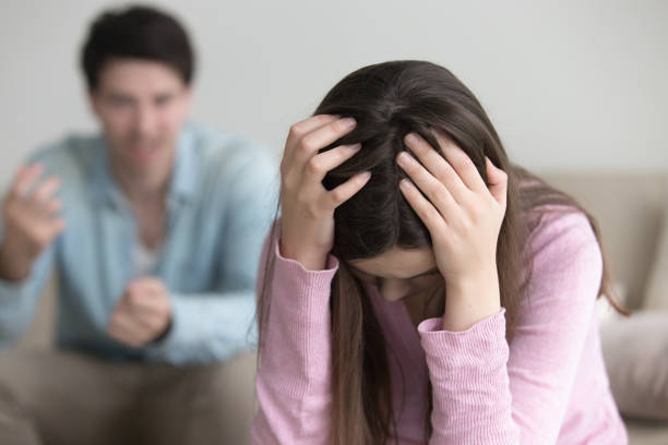 istock Frustrated upset wife suffering from aggressive husband, couple having argument 668986596