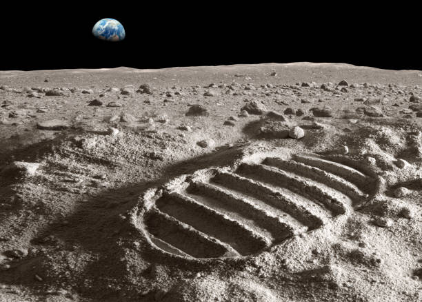 Footprint of astronaut on the moon Footprint of astronaut on the moon with earth above the horizon. Photo of the earth has been used with courtesy of NASA database. Photo of the moon surface and the footprint has been created in the studio. planetary moon photos stock pictures, royalty-free photos & images