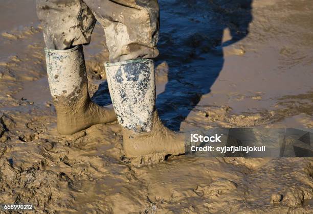 Muddy Work Boots Stock Photo - Download Image Now - Boot, Mud, Wet