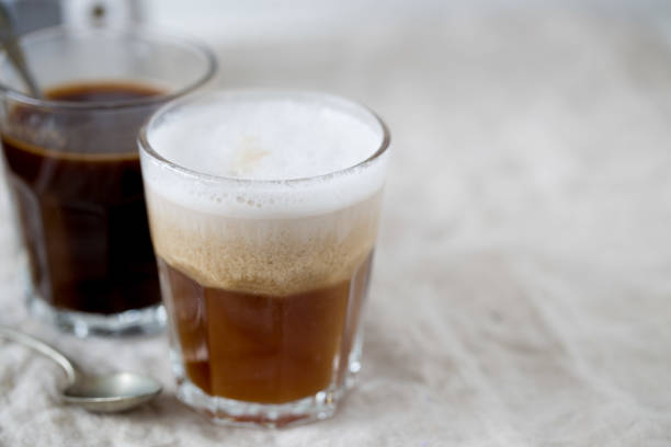 istock Hot latte and black coffee on white background. Morning concept 668992858