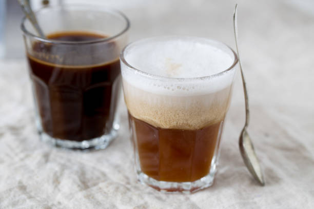 istock Hot latte and black coffee on white background. Morning concept 668996080