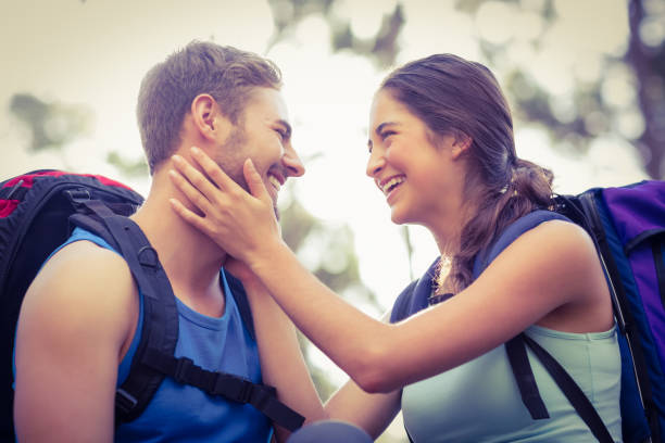 istock Young happy joggers looking at each other 668997168