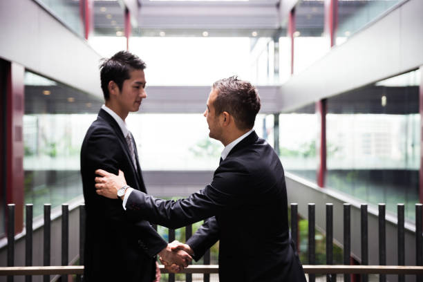 istock Japanese businessmen in the office 668999966