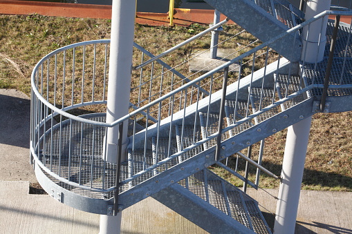 External steel staircase on a bridge