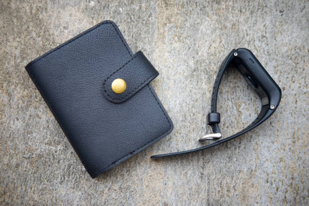 istock Black wallet and black watch, Business accessories 669002584