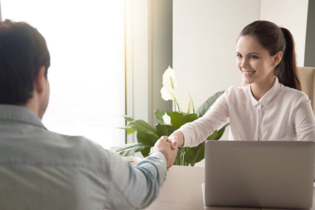 istock Business people handshaking at office, greeting a partner, job interviewing 669015914