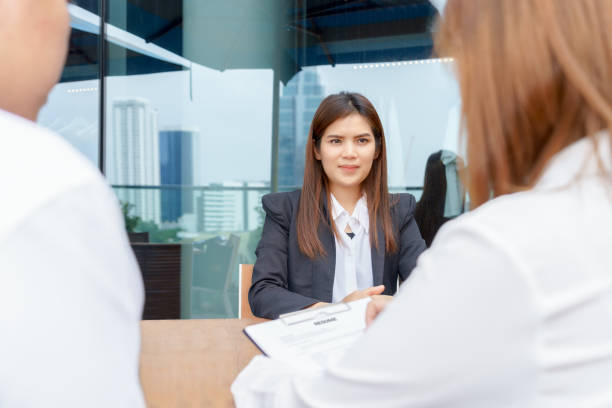 istock Excited businesswoman or candidate being interviewed by managers - interview concept. 669016510