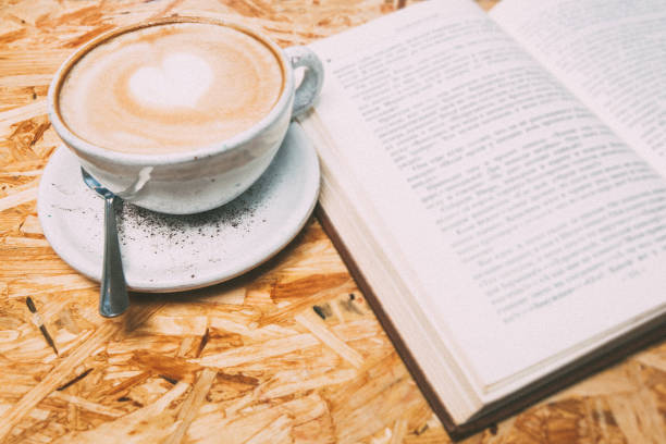 istock A cup of coffee and a book 669025634