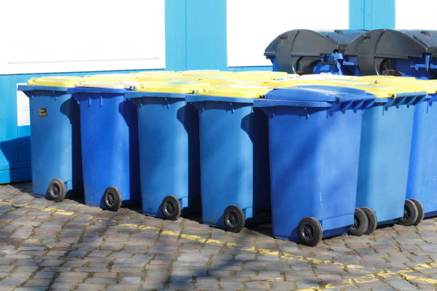 istock Yellow and blue tons, recyclable material bins 669025888