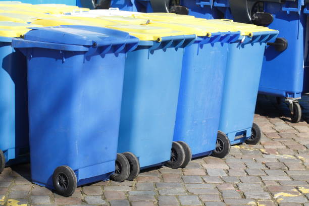 istock Yellow and blue tons, recyclable material bins 669025904