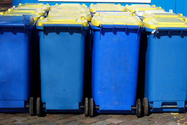 istock Yellow and blue tons, recyclable material bins 669025950