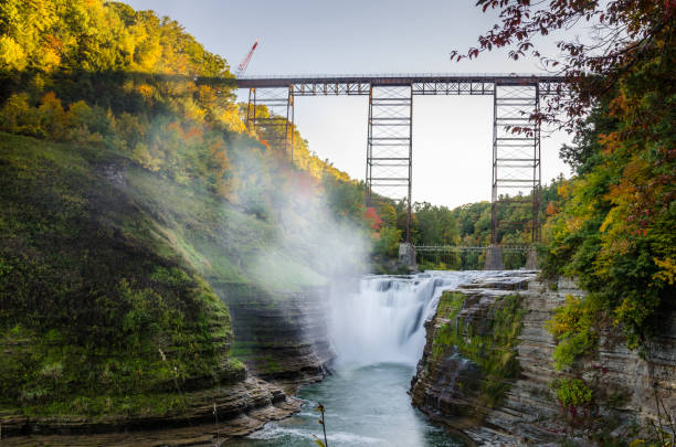 istock Railway Bridge over a Waterfall in Autumn 669034904