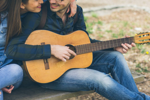 istock Love and music in the park 669037598