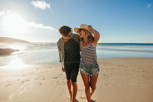 Loving couple enjoying a day on beach