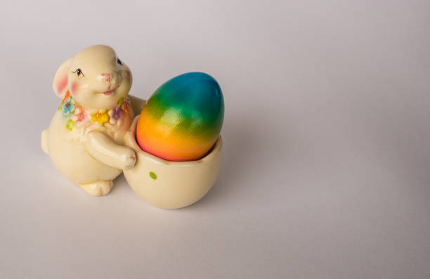 istock Easter bunny with painted colorful egg, Athens, Greece 669064758