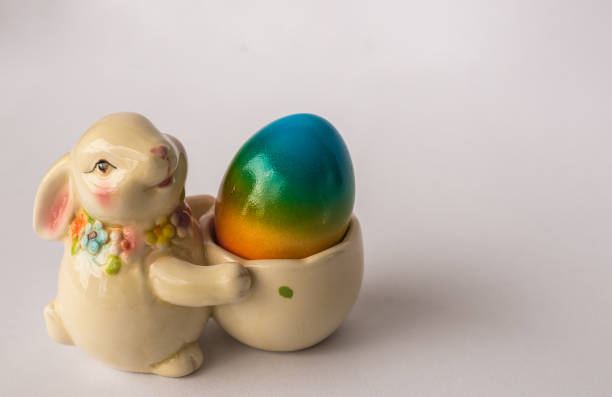 istock Easter bunny with painted colorful egg, Athens, Greece 669066984