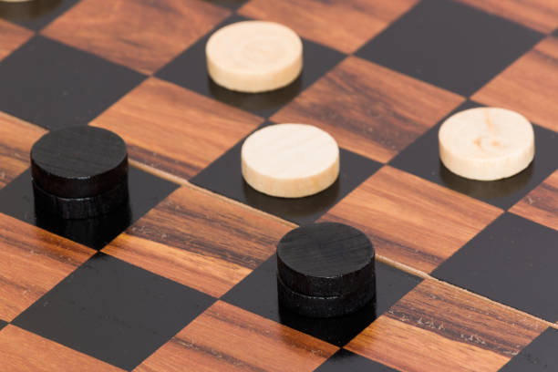 istock Tokens and lady on chessboard 669075574