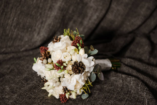 istock Stylish bridal bouquet on fabric 669077762