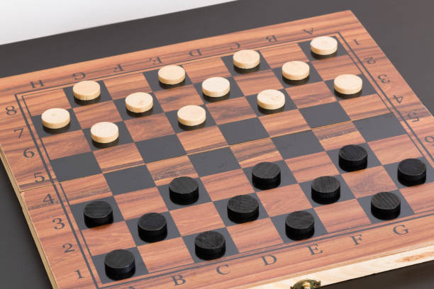 istock Tokens and lady on chessboard 669077972