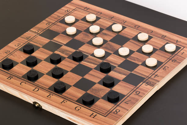 istock Tokens and lady on chessboard 669078184