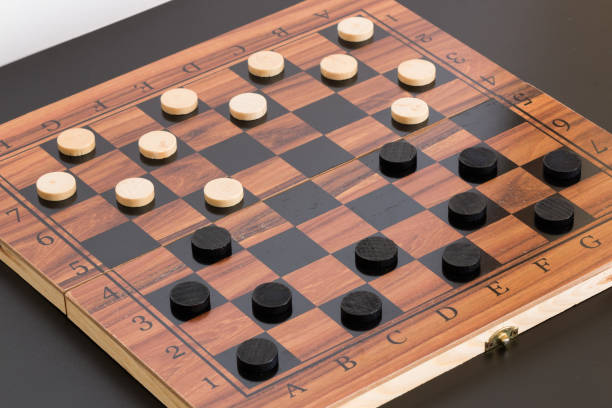 istock Tokens and lady on chessboard 669081038