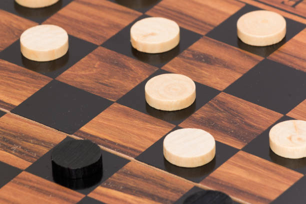 istock Tokens and lady on chessboard 669081138