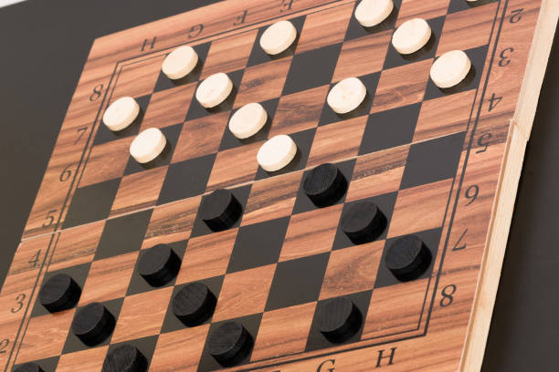 istock Tokens and lady on chessboard 669081384