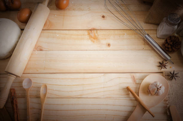 istock Blank wooden table background and bakery ingredients with copy space 669081956