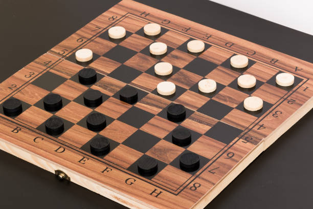 istock Tokens and lady on chessboard 669084670