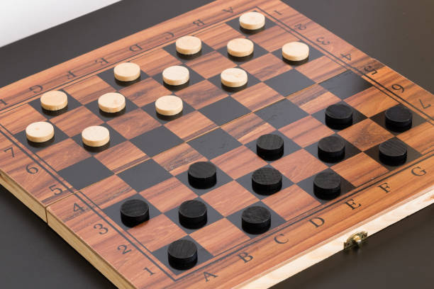 istock Tokens and lady on chessboard 669087506