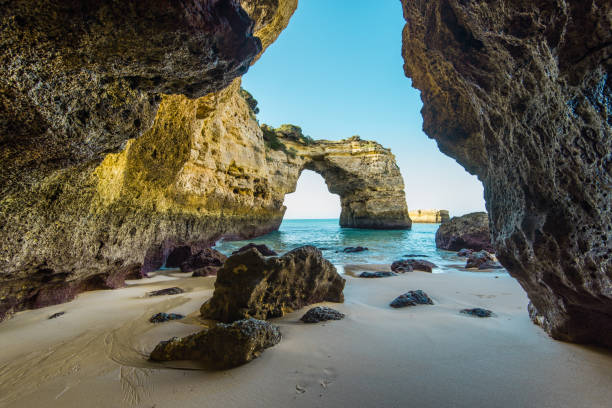 istock Sandy beach and cliffs in Algarve Atlantic coast, Portugal 669088146