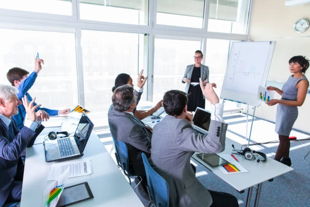 istock Business people in education room asking questions 669091466