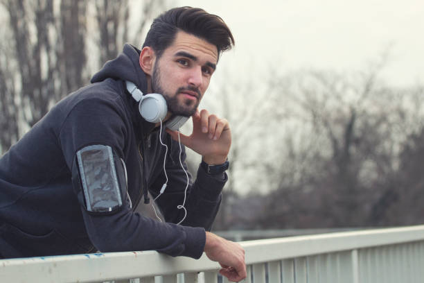 istock Jogger leaning on a fence 669091662