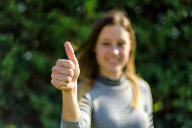 istock happy blond young woman 669097794