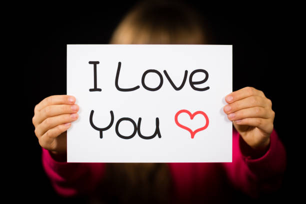istock Child holding I Love You sign 669098022