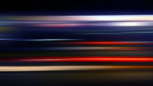 Photo of Speed motion background with vivid lighting in black - travel concept