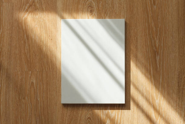 istock Blank canvas on wooden wall 669121510