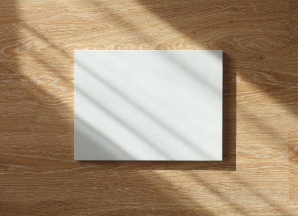 istock Blank canvas on wooden wall 669121532