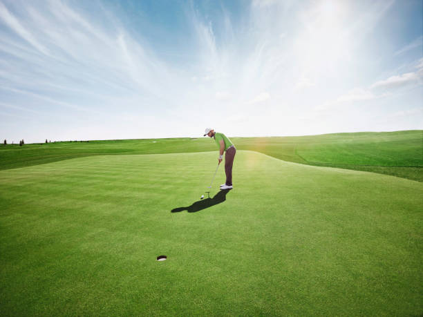 golfspieler - golfplatz green stock-fotos und bilder