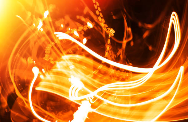 istock Vivid orange light illumination laser traces backdrop 669122598