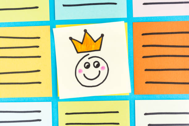 Happy king emoticon note paper concept