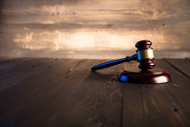 istock Judge striking the mallet, law and justice concept 669163392