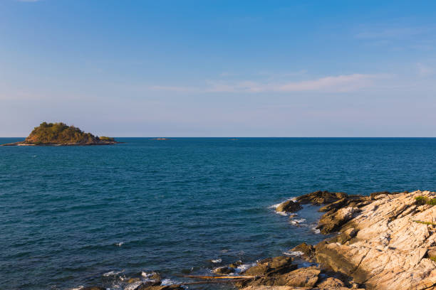istock Natural rocky beach and small island 669177006